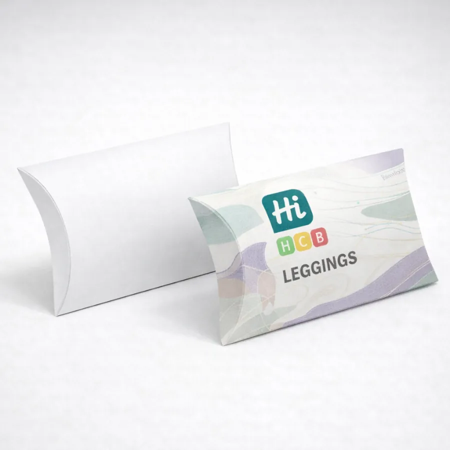 Two curved pillow boxes for clothing- one plain white and one with colourful patterned branding- class=
